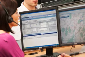 Operators on phone on Renault Trucks service center