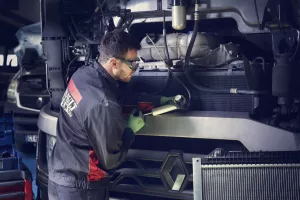 Man repairing trucks