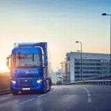 E-Tech T driving in the sunset