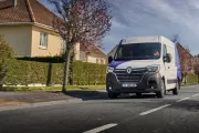 Renault Trucks E-Tech Master on the road in a city suburb