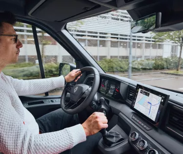 Renault Trucks Master Red EDITION Exclusive - van on the road in the streets of Lyon Vaise, driving position and dashboard, vehicle equipped with permanent rear-view mirror